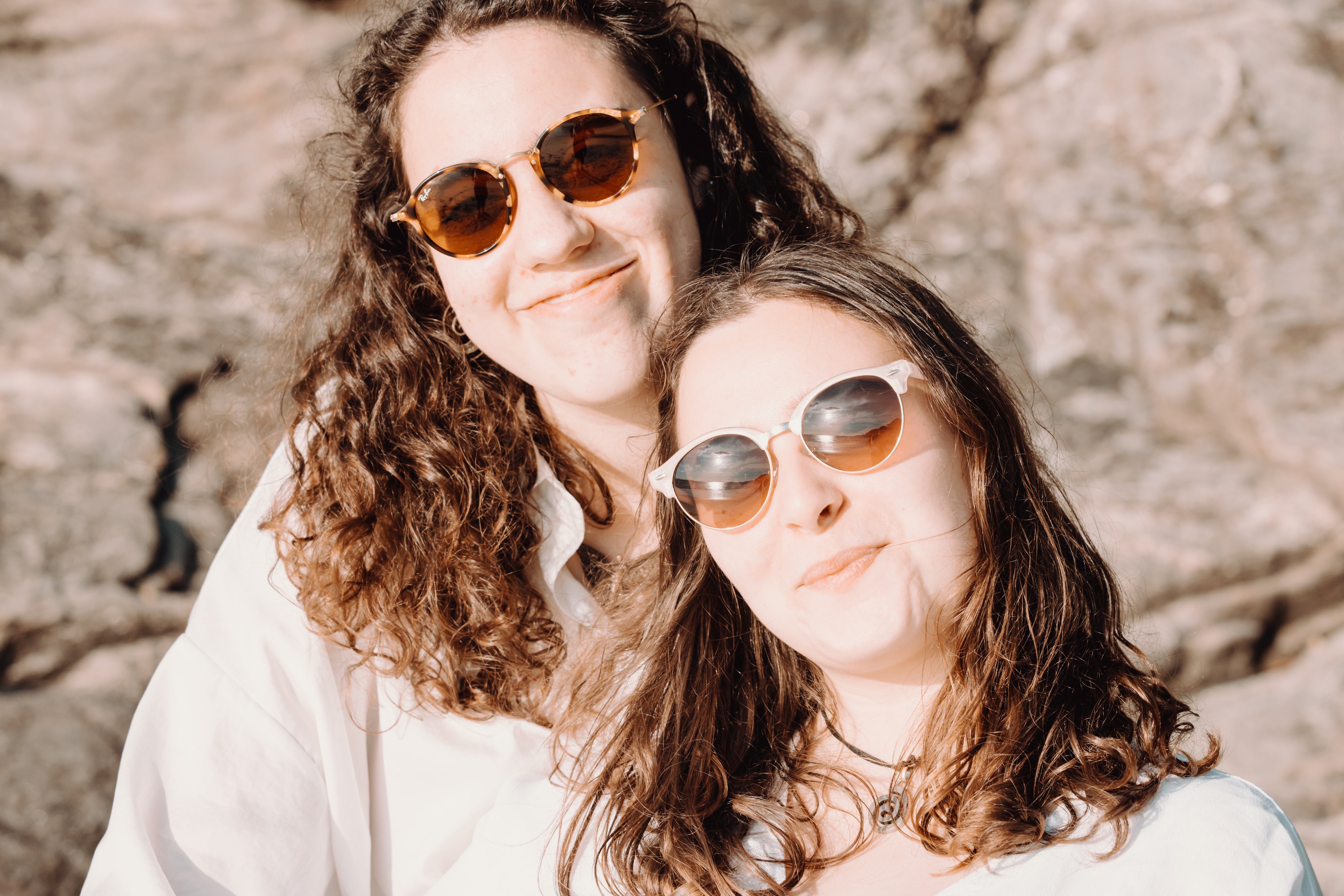 files/two-woman-in-sunglasses-smile-for-the-camera.jpg